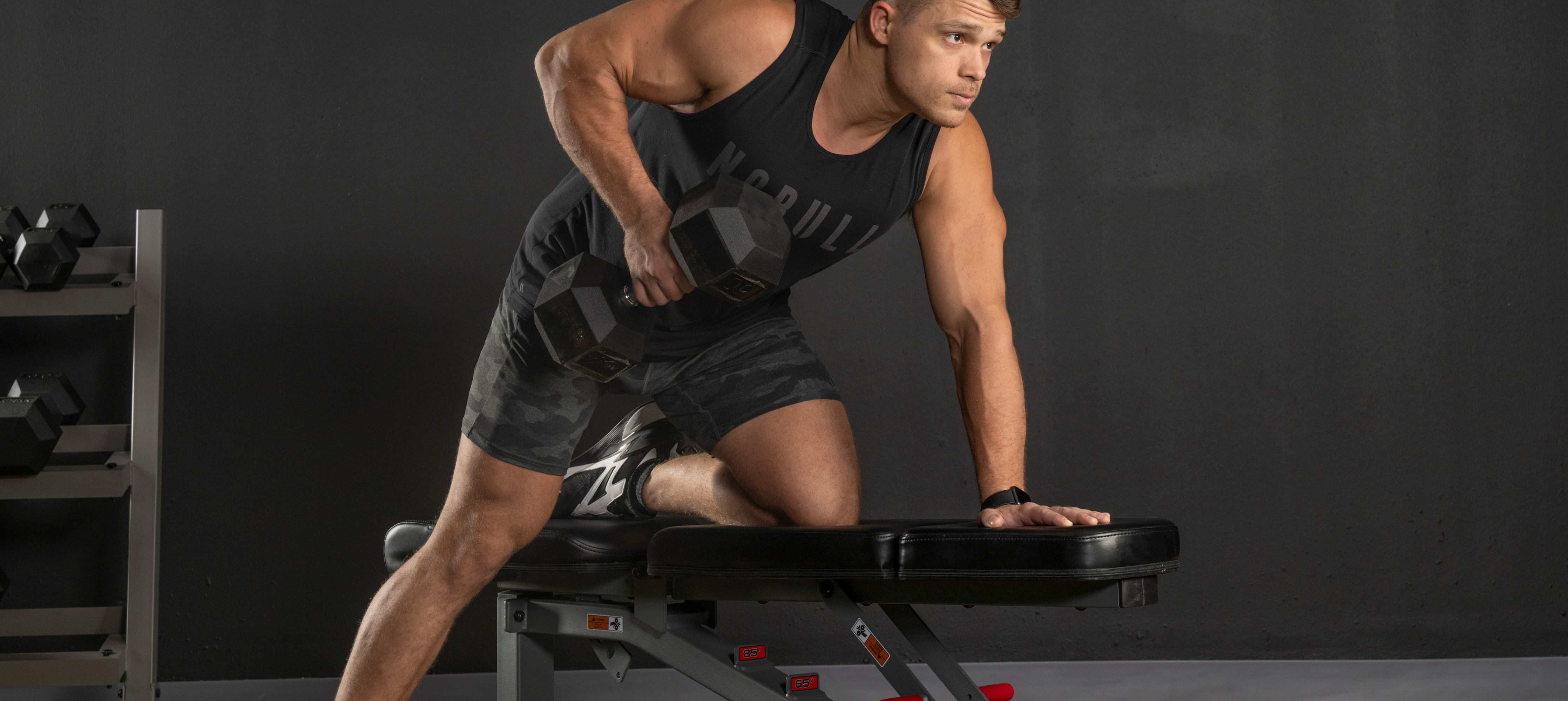 Man Doing Rows on a Bench